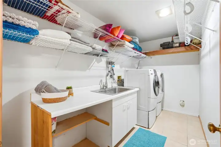 Laundry room with storage