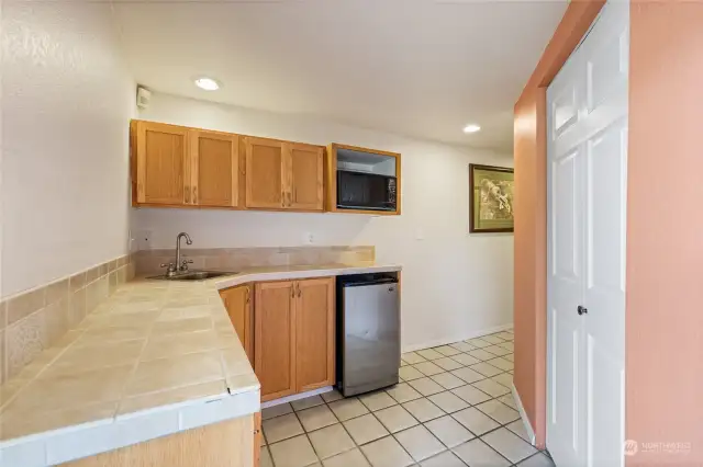 Wet bar downstairs makes this floor a versatile space.