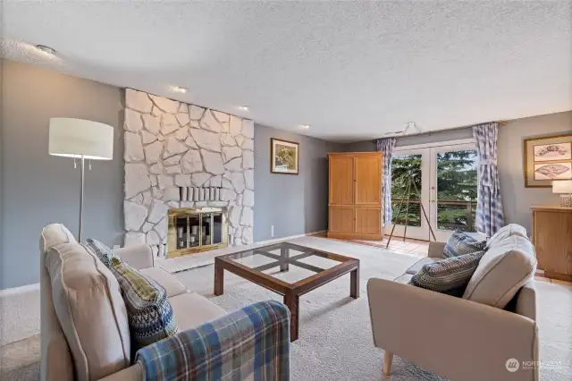 Enter into the spacious living room and relax while enjoying a view of the lake!