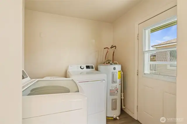 mud room/laundry room with door to backyard.
