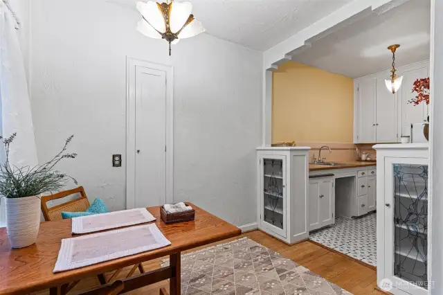Eating nook and kitchen storage.