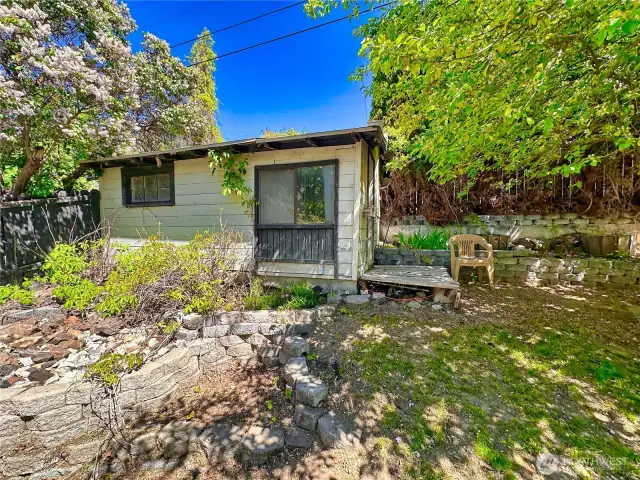 Shed on partially fenced property
