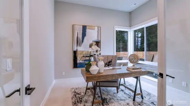 Main Level Den (photo is of the Model Home)