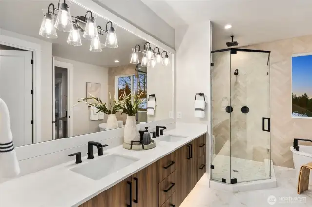 Primary Bedroom Bathroom of Lot 1 has similar design, finishes and color scheme as seen here (photo is a home recently built and sold by Builder)