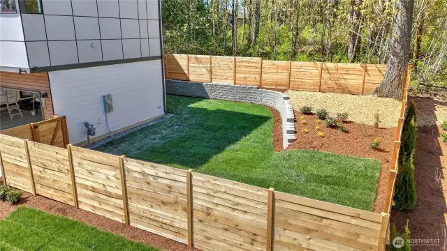 Lot #1 with its landscaping and fencing in!