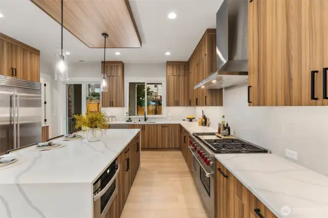 Home is equipped with similar luxury appliances, such as 48" Sub Zero refrigerator, 48" Wolf Double Oven, Zephyr Hood, Microwave Drawer and more! (photo is a home recently built and sold by Builder)