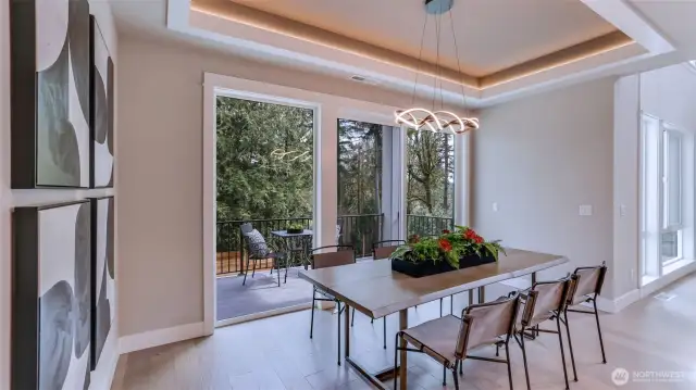 Spacious dining room adjacent Great Room. (photo is of the Model Home).