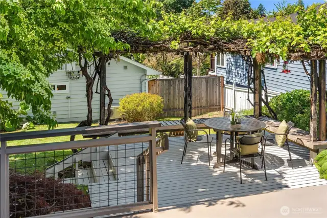Looking off the front deck towards another even bigger deck and fully fenced yard.