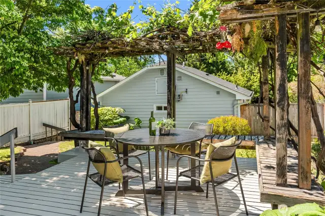 A wonderful sense of privacy embraces the back house with mature landscaping providing lush accent.