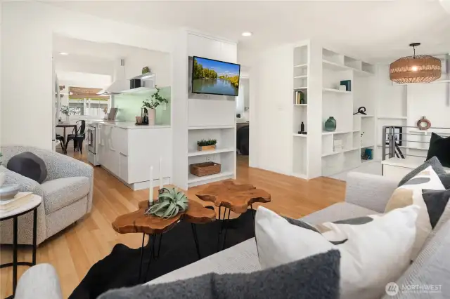 This architecturally designed home features surprises everywhere such as the extensive shelving with a whimsical design flair.