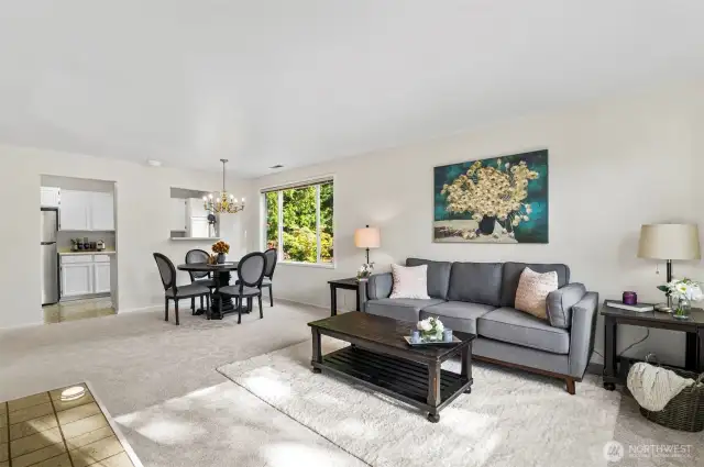 Spacious Living Area. Second floor Corner Unit allows for natural light to flow through the Windows.