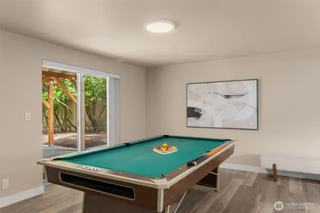 Lower level family room large enough for pool table and has separate entrance