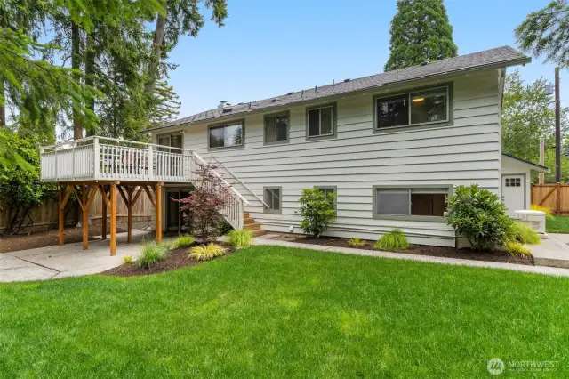 Take the steps down from the deck to the back yard- flat and private