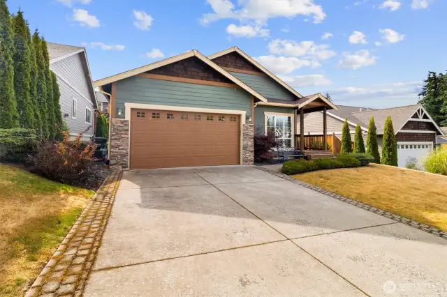 Large driveway and two car garage