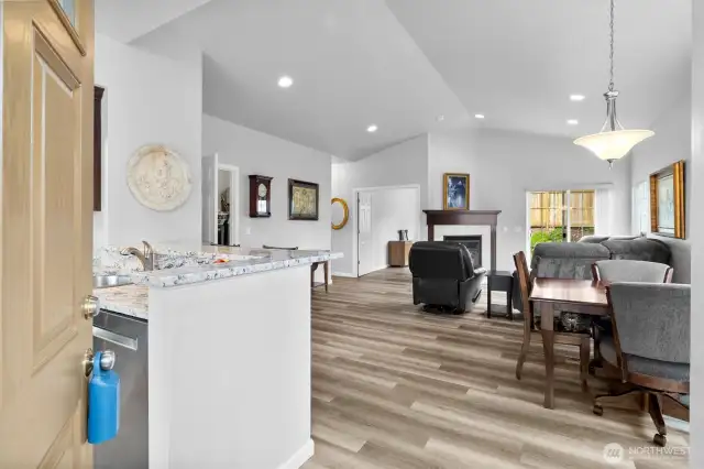 View from opening the front door, welcoming you in to the open and spacious floor plan of the home