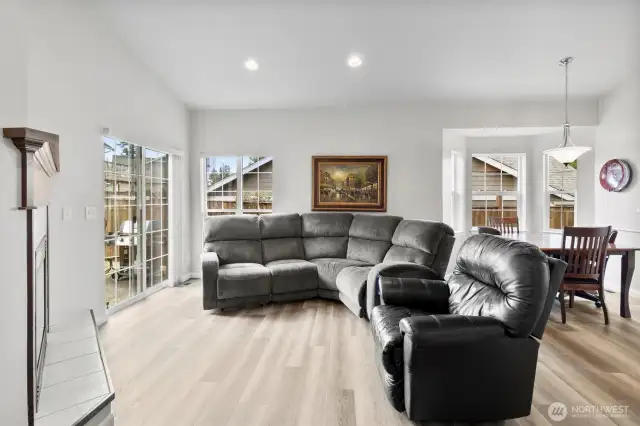 Large and open living room area with fireplace