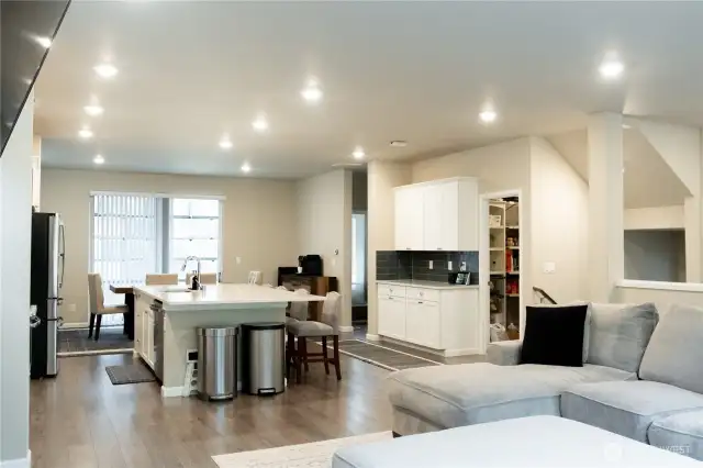 Seamless flow from living room into the kitchen and dining spaces, perfect for entertaining