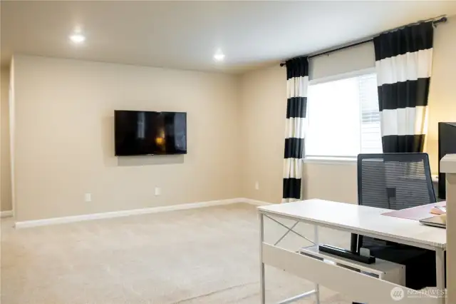 Spacious loft/rec room offering flexible living space