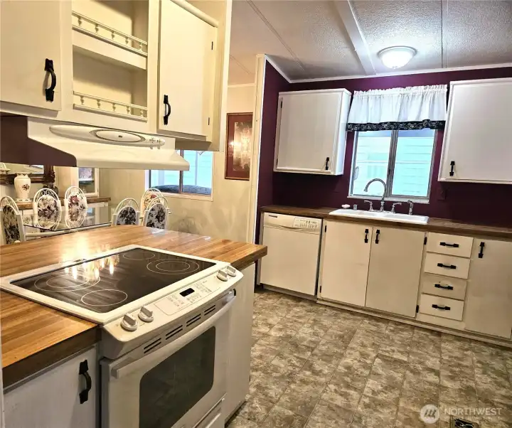 A generous, well-designed kitchen offering abundant cabinetry and extensive storage options, perfect for keeping everything.