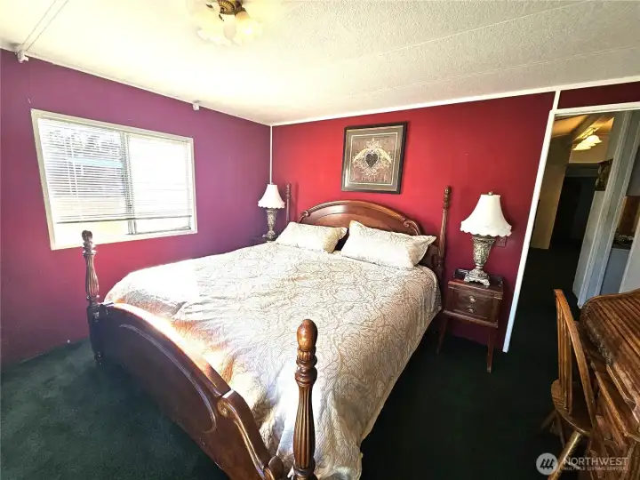 Comfortable primary suite with an adjoining bathroom for added privacy and convenience.