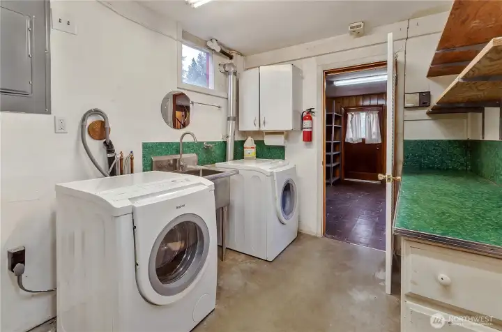 Not just laundry! There's also a shower and bathroom downstairs!