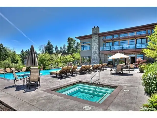AND a grand pool deck and spa with barbeque and outdoor fireplace  - Perfection!