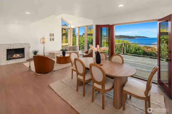 Open-concept living and dining area with abundant natural light and seamless indoor-outdoor flow.