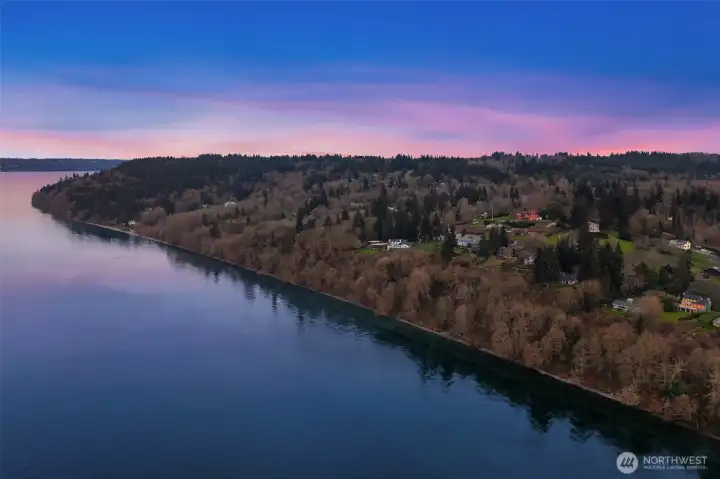Aerial shoreline view showcasing the scenic beauty and tranquil surroundings of Vashon Island.