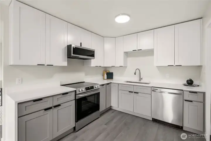 Quartz counters and designer cabinets