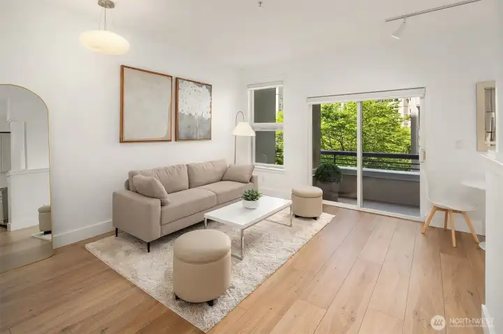 High ceilings, new paint, flooring and lighting