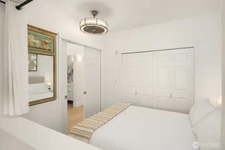 Bedroom alcove is conveniently located near bathroom and additional closet
