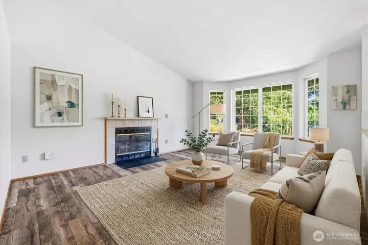 Cozy wood-burning fireplace - perfect for the fall and winter months. *virtual staging*