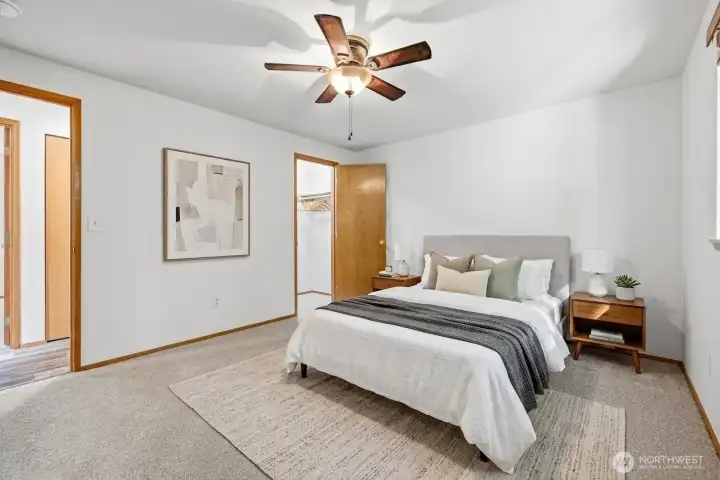 Walk-in closet off primary bedroom *virtual staging*