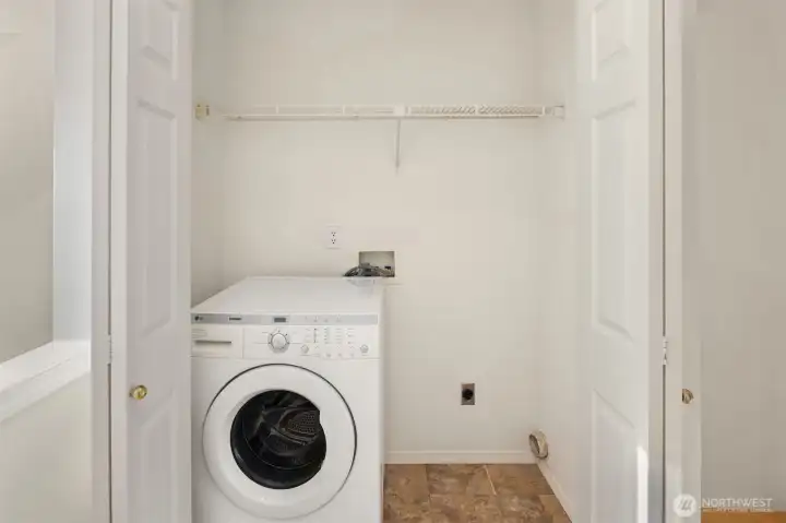 Laundry is conveniently located on upper level.