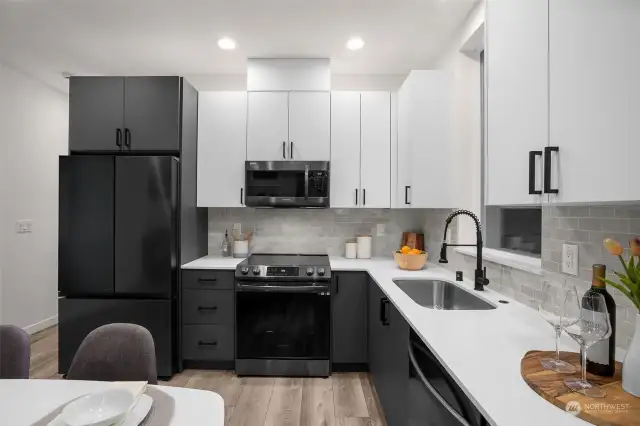 Meal prep is a breeze in these convenient kitchens with spacious countertops and plenty of storage! Photos of model home with similar layout, fit & finishes.