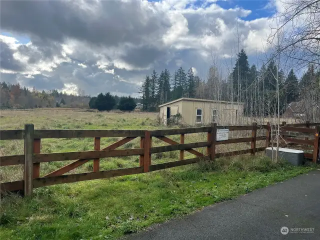 Gate/access to property, just before neighbors gate.