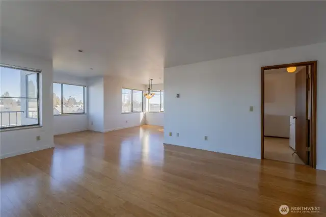 Living room with door to kitchen/laundry room