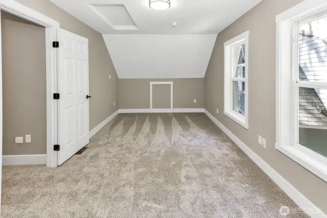 Upstairs bedroom with walk in closet.