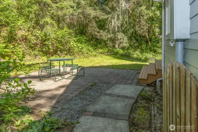 Backyard patio area off of kitchen/dining room