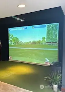 Golf Simulator in the ADU above the Garage with a separate entrance.