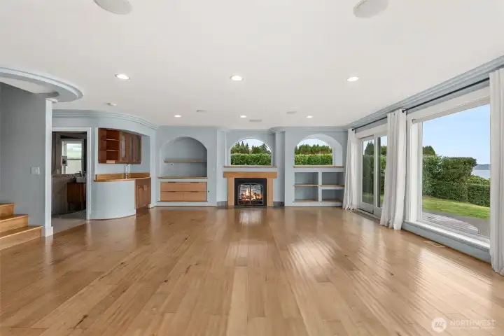 Gorgeous hardwoods! Many options to arrange the perfect living room layout all w/ sweeping views!