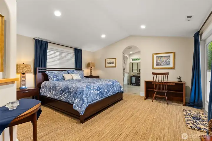 Main Floor Primary Bed features garden and Puget Sound Views! Door on the right to access North Patio.