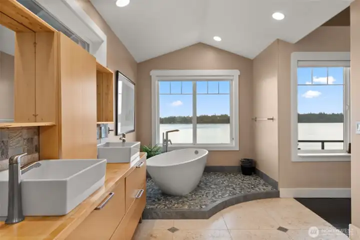 Relaxing Primary Bed En-Suite in the North Tower. This soaking tub is situated to take in MT Rainier Views!