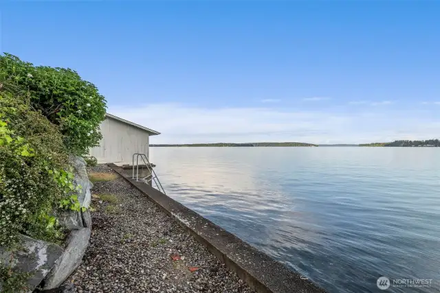 Photo shown at high tide. Beach is pebbly and tidelands transfer!