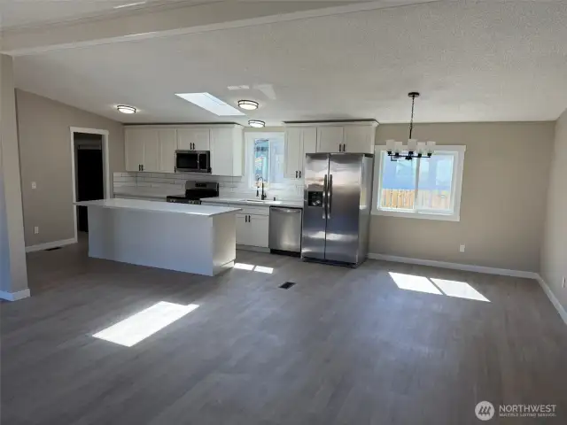 Main Entrance leads to kitchen & eating area