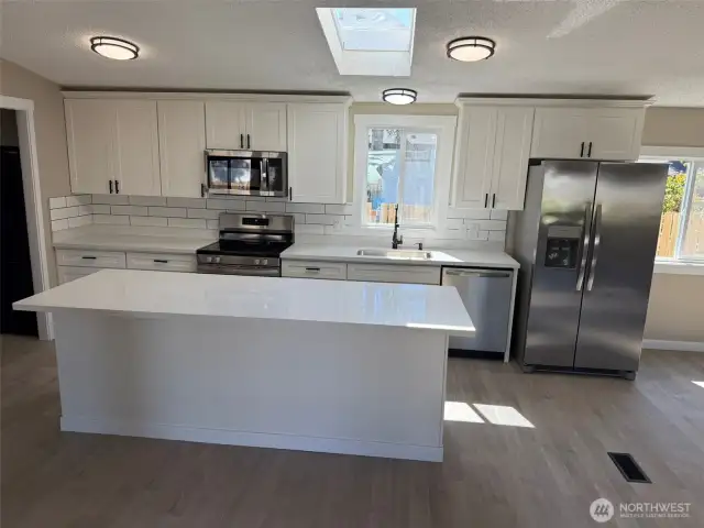 New stainless steel appliances & close up photo of kitchen