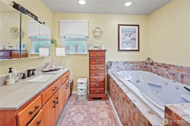 Primary bathroom with jetted tub and separate shower