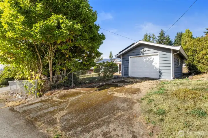 Alley access to the attached garage and back yard. Plenty of parking in front and back!