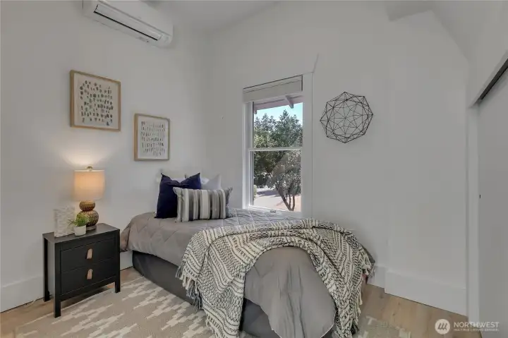 Second level side bedroom.  Mini-split for all year comfort.  Adjoining nook for desk or reading!