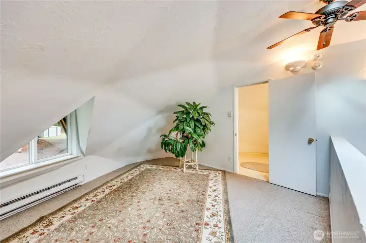 Upstairs loft area with attached bathroom